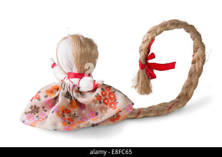 Russische traditionelle Reg-Puppe mit Tress isoliert auf weiss Stockfoto