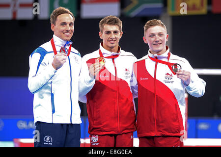 Max Whitlock (ENG) Goldmedaille, Daniel Keatings (SCO) Silbermedaille, Nile Wilson (ENG) Bronze-Medaille. Künstlerische Gymnastik-Men Al Stockfoto