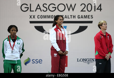 Medaille Zeremonie. Zoe Smith (GER) gewinnt die Goldmedaille. Gewichtheben - Gruppe Frauen 58 kg ein - SECC - Glasgow, Schottland, UK - 260714 Stockfoto