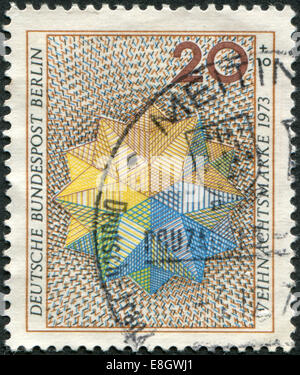 Deutschland - CIRCA 1973: Briefmarke gedruckt in Deutschland (West-Berlin), zeigt eine Weihnachten Stern, ca. 1973 Stockfoto