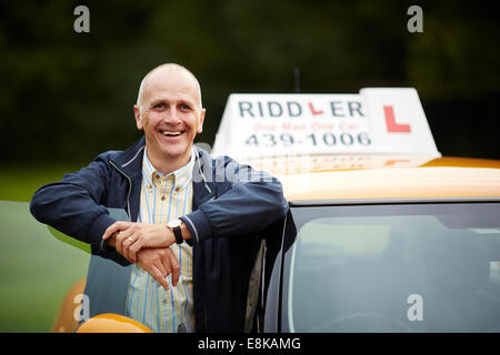 Driving Instructor Riddler Schule der Motorisierung von Robert Ridley Kursleiter Riddler Fahrschule der Motorisierung von Robert Ridley Stockfoto