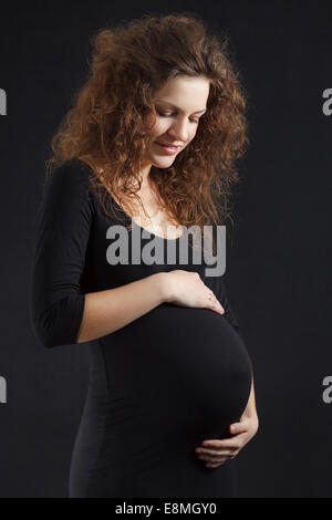 Schöne schwangere Frau Stockfoto