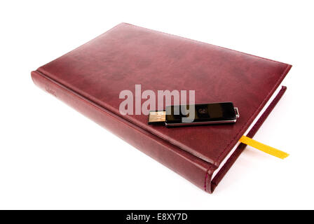 USB-Stick auf Leder notebook Stockfoto