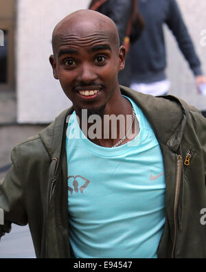 Mo Farah und seiner Frau Tania außerhalb der ITV Studios Featuring: Mo Farah Where: London, Vereinigtes Königreich bei: 16. April 2014 Stockfoto