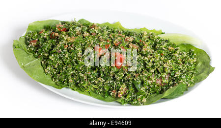 Hausgemachte libanesisch-Stil Tabouii gemacht mit rohe Petersilie, Minze, Gurke, Tomate, burghal aka Bulgar Weizen, Zitronensaft, Olivenöl Stockfoto