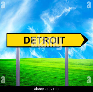 Konzeptionelle Pfeilzeichen gegen schöne Landschaft mit Text - DETROIT Stockfoto