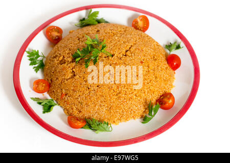 Türkische Bulgar Pilaw gemacht mit Bulgur, oder Burghul, Weizen, Zwiebel, Paprika und Tomaten, dies ist ein fester Bestandteil der türkischen Küche. Stockfoto