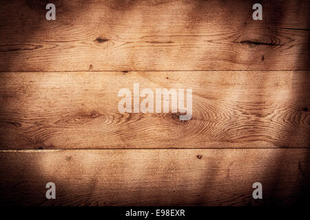 Rustikale Vintage Holz-Hintergrundtextur mit einem schweren Vignette und Woodgrain Muster auf den braunen Holzbretter Stockfoto