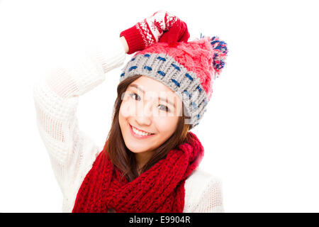 glückliche junge schöne Frau in Winterkleidung isoliert auf weißem Hintergrund Stockfoto