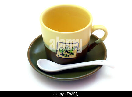 Keramische Tasse auf eine Untertasse Stockfoto