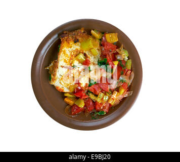 Ei in einem Loch ist Frühstückskarte mit Tomaten und Paprika Stockfoto