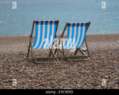 Dechchairs am Strand von Brighton Stockfoto