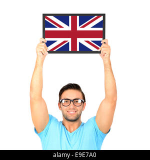 Porträt eines jungen lässig hochhalten Board mit Nationalflagge des Vereinigten Königreichs Stockfoto