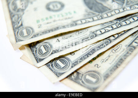 Einem Dollar-Scheine mit geringen Schärfentiefe aufgefächert Stockfoto