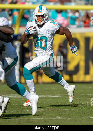 Jacksonville, FL, USA. 26. Oktober 2014. Miami Dolphins Runningback Daniel Thomas (30) während der zweiten Hälfte NFL Spiel Action zwischen den Miami Dolphins und den Jacksonville Jaguars. Delphine besiegte Jaguare 27-13 bei EverBank Field in Jacksonville, FL Credit: Cal Sport Media/Alamy Live News Stockfoto