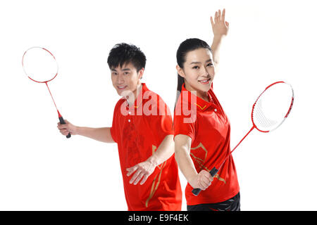 Athleten, die Badminton spielen Stockfoto