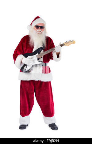 Santa Claus spielt Gitarre mit Sonnenbrille Stockfoto