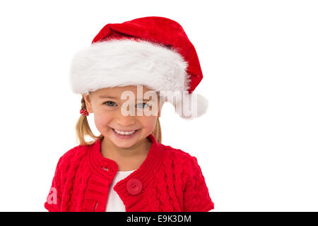 Niedliche kleine Mädchen tragen Weihnachtsmütze Stockfoto