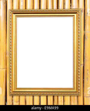 leere Goldrahmen auf Bambus Wand Hintergrund Stockfoto