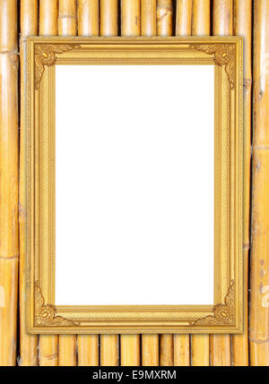 leere Goldrahmen auf Bambus Wand Hintergrund Stockfoto