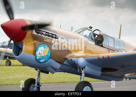 Duxford, Großbritannien - 13. Juli 2014: Vintage Curtiss P40 Warhawk im Duxford Flying Legends Airshow Stockfoto