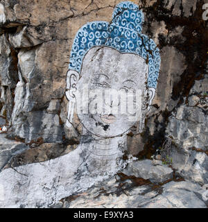 Buddha Gemälde auf einer Gesteinsoberfläche in Bhutan, Stockfoto