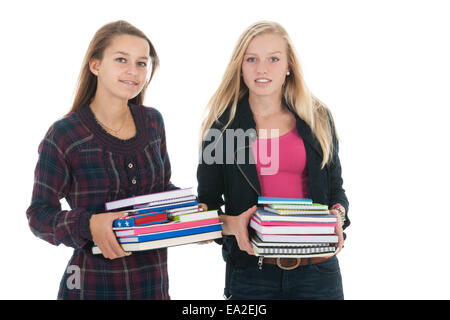 Schulmädchen zu Fuß in der Schule mit schweren Schultaschen Stockfoto
