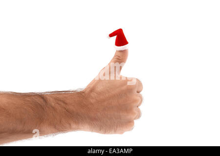 Weihnachten-Daumen hoch in Nikolausmütze isoliert auf weiß Stockfoto