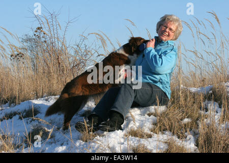 Frau mit Border Collie Stockfoto