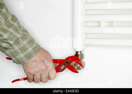 Arbeiten an Heizung Stockfoto