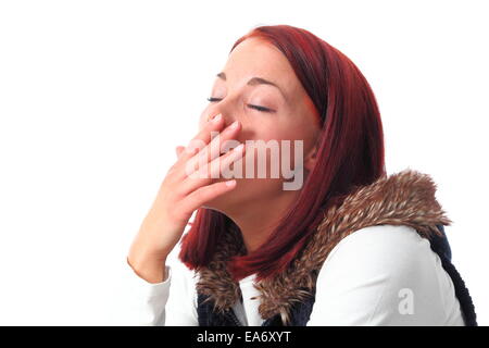 Eine junge Frau isoliert Frau Gähnen auf weiss Stockfoto