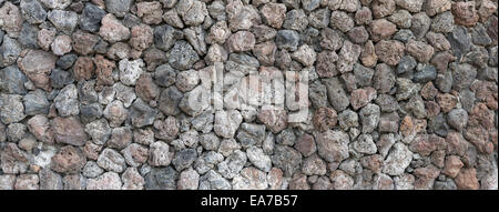 Vesikuläre Stein Wandverkleidung auf Teneriffa als Hintergrund. Stockfoto