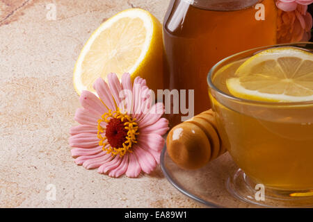 Tasse Tee und Honig Stockfoto
