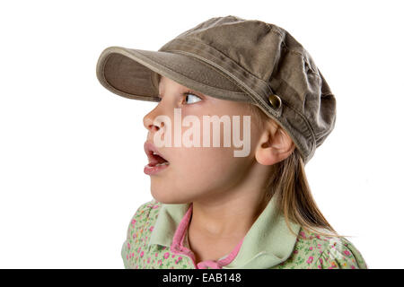 Mädchen im grünen Hut hören / Alarm.  Sie haben davon gehört...  Isoliert auf weiss. Stockfoto