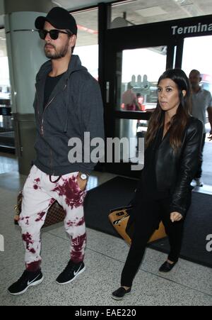 Kourtney Kardashian und Scott Disick ankommen am Flughafen Los Angeles International (LAX) Featuring: Kourtney Kardashian, Scott Disick Where: Los Angeles, California, Vereinigte Staaten von Amerika bei: 10. Mai 2014 Stockfoto