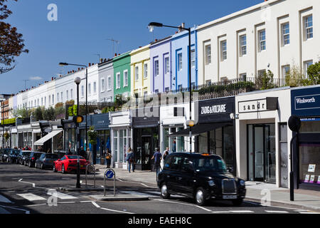 Bunte Reihe von Boutiquen auf Westbourne Grove, Notting Hill, London, England. Stockfoto