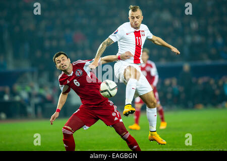 Tiflis (Tbilissi), Georgien. 14. November 2014.  UEFA EURO 2016 Qualifikation, Georgien - Polen. n Z [Kamil Grosicki] (Polska), Fot [Akaki Khubutia] (Gruzja). Lukasz Skwiot/Foto Olimpik Credit: Cal Sport Media/Alamy Live-Nachrichten Stockfoto