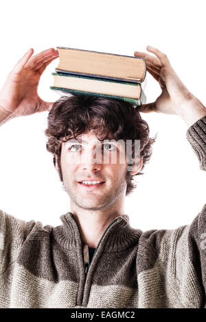 eine hübsche Studentin mit einige Bücher über einen weißen Hintergrund isoliert Stockfoto