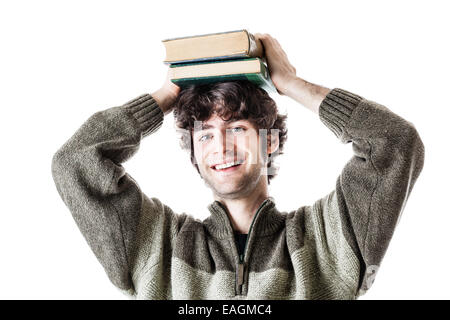 eine hübsche Studentin mit einige Bücher über einen weißen Hintergrund isoliert Stockfoto