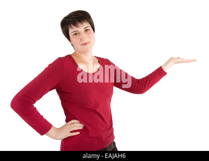 Frau, die etwas auf die Palme ihrer Hand Stockfoto