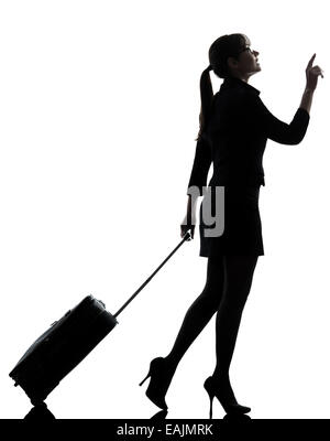 ein Geschäftsreisender Frau zu Fuß Silhouette Studio isoliert auf weißem Hintergrund Stockfoto