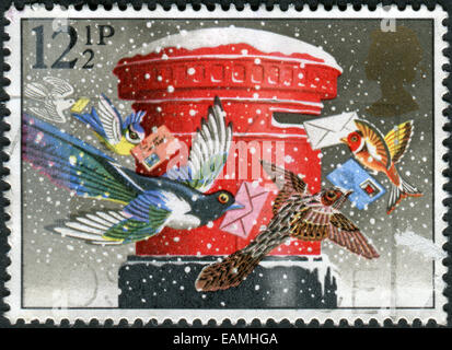 Vereinigtes Königreich - ca. 1983: Briefmarke gedruckt in England, Weihnachten Thema zeigt ein Postfach (Säulenformat), ca. 1983 Stockfoto