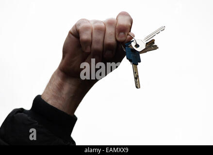 Hand mit den Tasten Ringen mit Bezug auf November 1989, wenn Menschen wie diese appellierte die kommunistische Führung des Landes zum Rücktritt wird während des Treffens der Gedenkstätte des 25. Jahrestages der Ereignisse des Jahres 1989 in Prag, Tschechische Republik, 17. November 2014 angesehen. Tschechischer Präsident Milos Zeman, Bundespräsident Joachim Gauck und auch den Präsidenten der Länder der Visegrád-Gruppe nahm das Denkmal zu sammeln. Hunderte Zeman´s Gegner waren Pfeifen während seiner Rede, werfen von Objekten auf die Bühne und gab ihm eine rote Karte. (CTK Foto/Katerina Sulova) Stockfoto