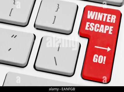 Winter-Flucht auf eine Computer-return-Taste gedruckt Stockfoto