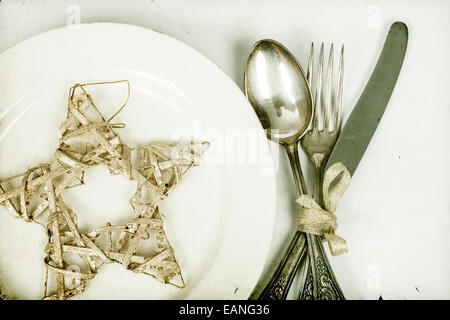 Vintage Silber Tisch Geschirr und Weihnachtsstern Stockfoto