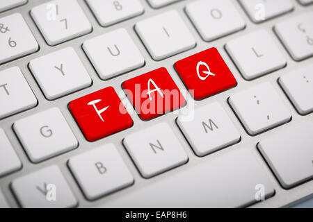 Das Wort 'FAQ' geschrieben am metallischen Tastatur Stockfoto