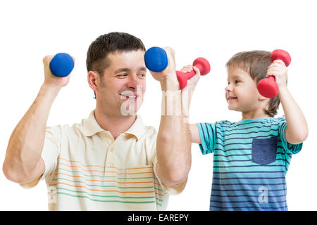 Papa und Kind Sohn Übung mit Hanteln zusammen Stockfoto