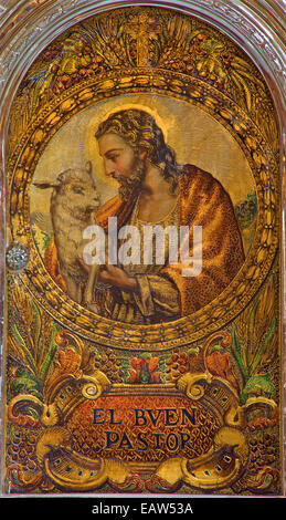 Sevilla - Jesus Christus als guter Hirte. Malen Sie auf dem Tabernakel in der Kirche Iglesia de San Roque vom 19. Jhdt. Stockfoto