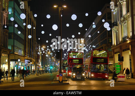 London, UK. 20. November 2014. Weihnachtsbeleuchtung und Dekorationen in Oxford Street, London, England-Credit: Paul Brown/Alamy Live News Stockfoto