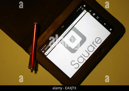 Quadratische Zahlungen app Logo auf Tablet-Bildschirm angezeigt wird, mit Stift, London gegründet von Jack Dorsey und Jim McKelvey Stockfoto